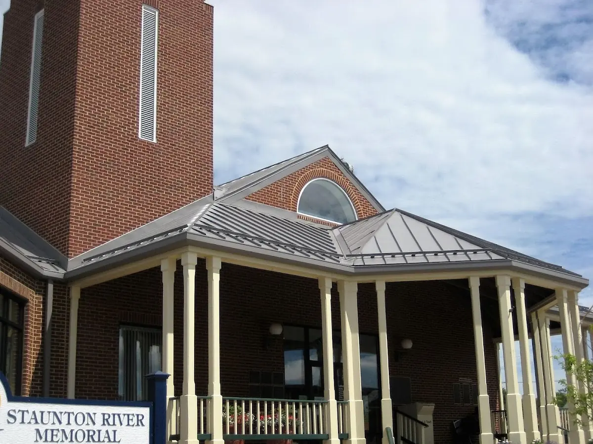 Skilled roofing craftsmen working on a residential roof in Casstown